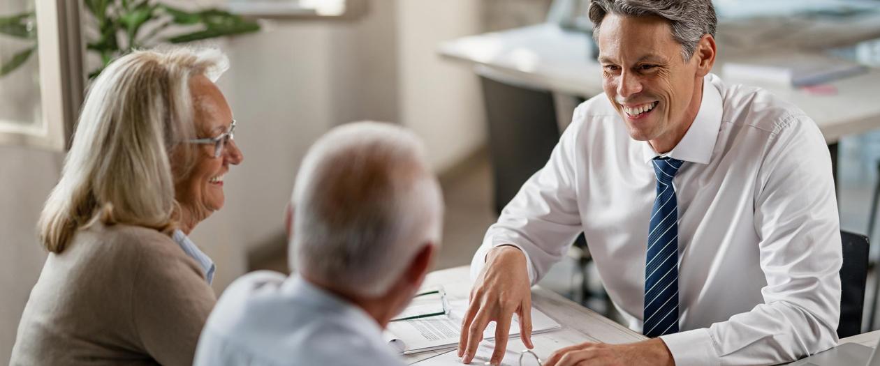 senior couple meeting with banker